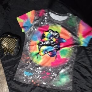 T Shirt small but is a hair bigger to me